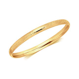 14K Yellow Gold Dome Style Children's Bangle with Diamond Cuts